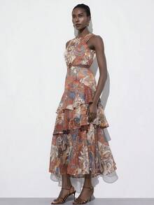 Aveloria Modichic 精准染色，砖红色和石板蓝色调，波西米亚艺术风格，度假休闲风，镂空圆圈设计，多层褶皱细节，收腰显瘦，蛋糕裙廓形，轻盈雪纺面料，柔软飘逸，适合海滩度假、夏季派对、户外音乐节、艺术展览和休闲旅行，展现无拘无束、自由奔放的浪漫气息。欧美时尚高端度假性感雪纺短款印花叠层无袖连衣裙 - 彩色 - 查看 3