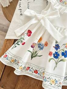 SHEIN Vestido casual para niña con cuello redondo, volantes en el bajo y estampado floral tejido - Blanco - Ver 3