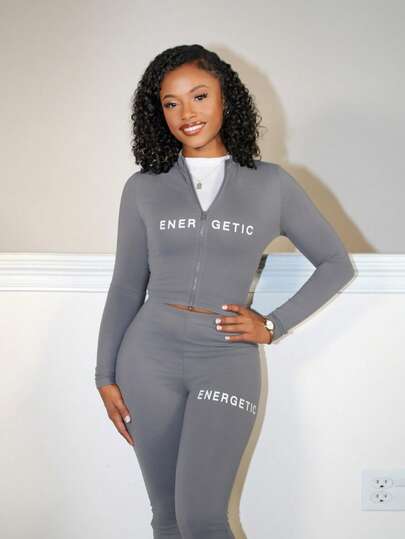 Steph T 女士2入組休閒基礎款高彈性修身長袖拉鍊上衣和長褲套裝，帶字印花