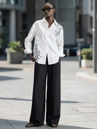 Ontre 2026春夏新款女式梭织面料花卉刺绣撞色长袖纽扣衬衫，宽松落肩设计，适合情人节、婚礼季、节日场合穿着。