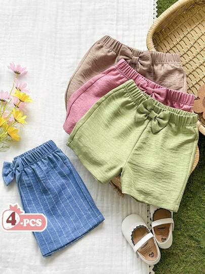 SHEIN Vintaside Kids Bộ 4 quần short bé gái dáng suông, cạp chun, thắt nơ, màu xanh lá cây/kaki/hồng/xanh dương, đa năng và thời trang cho mùa hè.