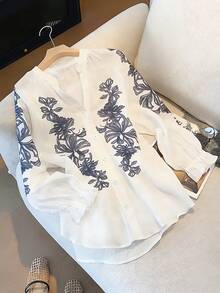 GlowEve Camisa de manga larga con estampado bordado blanco, blusa suelta, casual y ligera con cuello en V de moda para ir al trabajo - Blanco - Ver 1