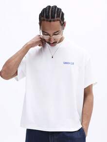 Camiseta de manga corta con cuello redondo y corte holgado para hombre , con estampado de bolsa de malla grande con diseño de limón en la espalda y logotipo frontal, camiseta casual de - Negro - Ver 4