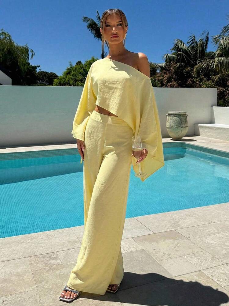 Aloruh 2pcs Women Flowy One-Shoulder Cape Sleeve Crop Top And Minimalist Long Pants Set Summer Outfits   Summer Clothes   Summer Outfits For Women Summer Holiday Outfits Vacation Vacation Outfits Women Holiday Outfits For Women  Summer Holiday Outfits Vacation  Vacation Outfits For Women      Summer Vacation Outfits  Beach Vacation Outfits For Women Creamy Yellow Casual Suit, Off-Shoulder And Asymmetrical Summer Lounge Set Yellow Two Piece Set Summer Pant Set - Yellow - View 4