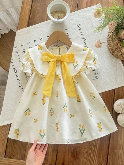 SHEIN Babygirl Cute Summer Floral Pattern Yellow Bow Tie Short Sleeve Dress