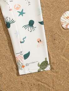 SHEIN Đồ bơi cho bé trai, áo tắm liền thân, tay dài và quần dài, có khóa kéo dễ mặc vào và cởi ra, vải dệt kim, họa tiết rùa dễ thương in kỹ thuật số, đồ bơi đi biển cho bé trai. - Nhiều màu - Xem 6