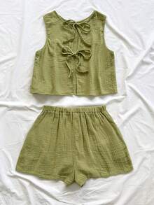 SHEIN WYWH 女士度假休闲宽松露背系带A字型吊带背心，搭配带口袋的松紧腰休闲短裤，沙滩/海边女士夏季两件套短款套装，适合度假穿着。 - 橄欖綠 - 查看 2