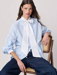 Nöista 浅色条纹衬衫，宽松版型，搭配超大领结和装饰性打结纽扣。甜美复古，是春夏日常穿着和休闲通勤的理想之选。 - 卡其色 - 查看 3