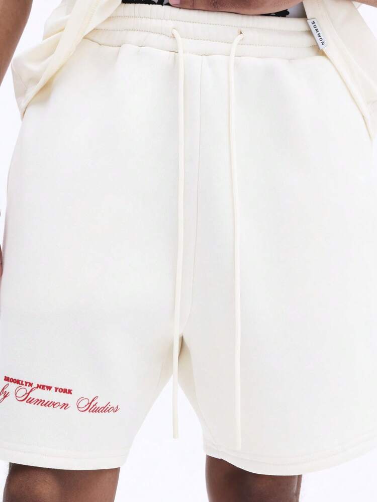Cream Graphic Logo Printed Regular Shorts