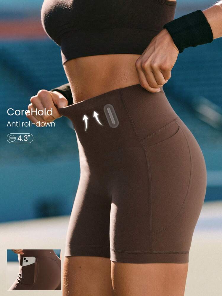 4.3インチ CoreHold FeatherFit™-Sculpt アスファルト押し付け前面なしコルセットサポート腹部コントロールバイカーショーツ サイドポケット付き 滑り止めストリップ ミディアムインパクト ランニング ジョギング トレーニング ジム ワークアウト