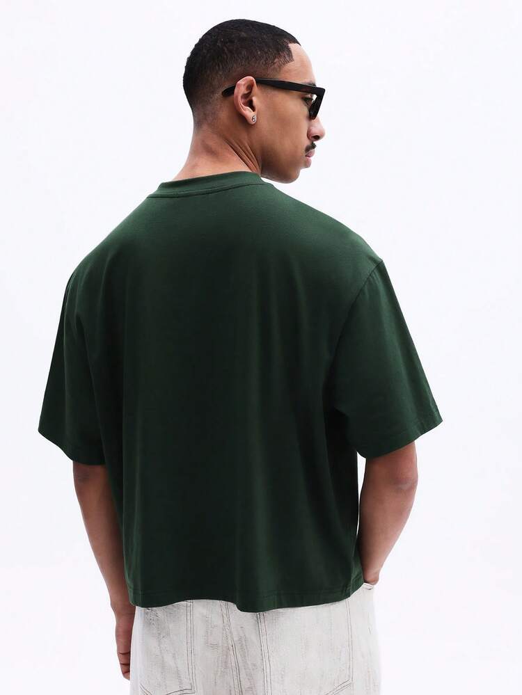 Camiseta oversized de gola redonda com estampa de texto