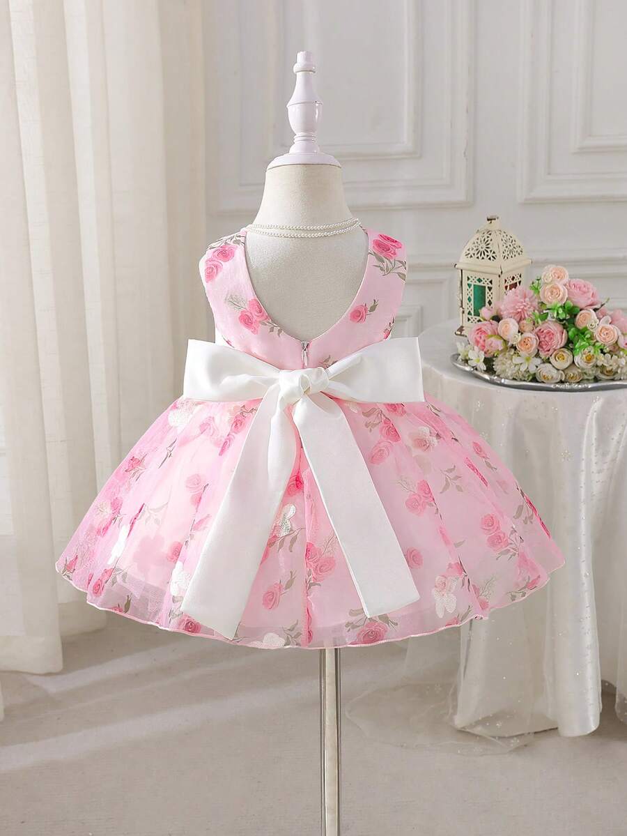 SHEIN Glamorique Kids Đầm satin thắt nơ cho bé gái dự tiệc, đầm dự tiệc cổ chữ V không tay hở lưng, đầm công chúa cho bé gái, đầm in hoa màu hồng thêu 3D, đầm dự tiệc sinh nhật, đám cưới, ngày lễ. - Màu Hồng baby - Xem 1