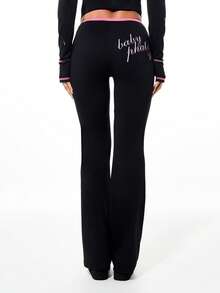 BABYPHAT Women's High Waisted Flare Leggings With Tie Waist Detail And Side Contrast Trim For Casual Everyday Wear - Black - View 2