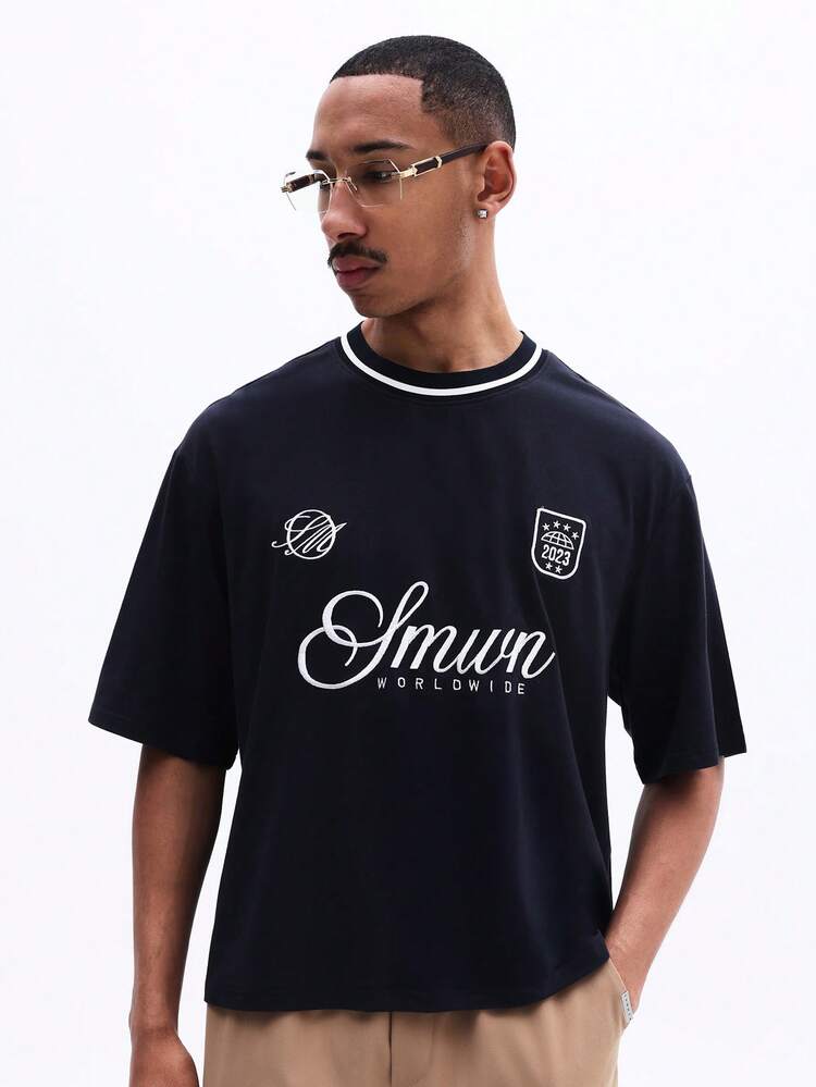 Oversized Graphic T-Shirt With Script Design