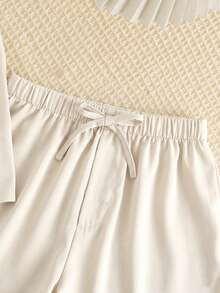 SHEIN 少女休闲优雅简约无袖蝴蝶结宽松背心上衣和松紧腰短裤两件套，米色 - 白色 - 查看 3