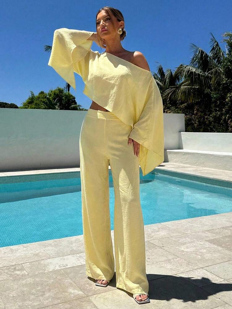 Aloruh 2pcs Women Flowy One-Shoulder Cape Sleeve Crop Top And Minimalist Long Pants Set Summer Outfits   Summer Clothes   Summer Outfits For Women Summer Holiday Outfits Vacation Vacation Outfits Women Holiday Outfits For Women  Summer Holiday Outfits Vacation  Vacation Outfits For Women      Summer Vacation Outfits  Beach Vacation Outfits For Women Creamy Yellow Casual Suit, Off-Shoulder And Asymmetrical Summer Lounge Set Yellow Two Piece Set Summer Pant Set - Yellow - View 1