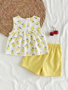 SHEIN Vintaside Kids 女童两件套夏季圆领无袖上衣搭配红色短裤。清新红白撞色，梭织面料，宽松版型。风格甜美、优雅、田园风，通体印有樱桃图案，活泼可爱。适合日常外出、上下学、参加派对、生日聚会、度假旅行等场合。 - 黃色 - 查看 2