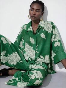 Frievida 轻松度假风，休闲日常穿搭，大碎花图案，宽松廓形，宽袖阔腿裤，轻盈丝滑的亚麻混纺面料，透气舒适，适合度假、周末聚会、艺术展览、夏季户外活动和居家生活，打造轻松舒适、自然清新的时尚风格。亚麻混纺面料，宽松纽扣衬衫，侧开衩设计，搭配松紧腰阔腿裤，两件套。 - 綠色 - 查看 1