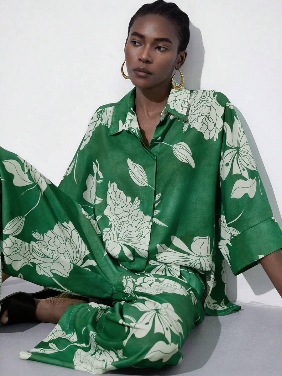 Frievida 轻松度假风，休闲日常穿搭，大碎花图案，宽松廓形，宽袖阔腿裤，轻盈丝滑的亚麻混纺面料，透气舒适，适合度假、周末聚会、艺术展览、夏季户外活动和居家生活，打造轻松舒适、自然清新的时尚风格。亚麻混纺面料，宽松纽扣衬衫，侧开衩设计，搭配松紧腰阔腿裤，两件套。 - 綠色 - 查看 1