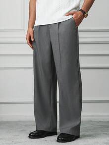 HUEFORM 男士纯色宽松阔腿褶裥休闲裤，采用厚实优质的纹理面料，是注重品质人士的理想之选，也是通勤必备单品。灰色男士褶裥西装裤 - 灰色 - 查看 4