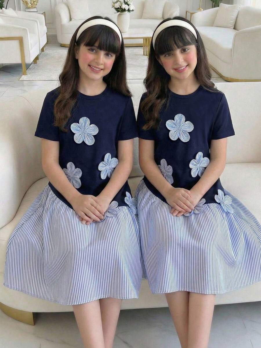 SHEIN 女童休闲连衣裙：采用纯色和条纹拼接设计，并饰以精致的3D立体花朵图案。