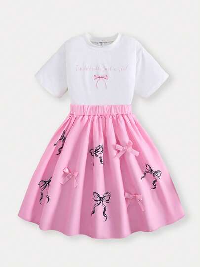 Casuvi Kids 1 Conjunto de Camiseta de Manga Corta con Estampado de Letras Blanca Dulce y Linda (con Decoración de Lazo Rosa) Combinada con Falda Decorada con Múltiples Lazos Rosas, Grosor Regular, Conjunto para Uso Diario, Verano