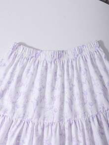 SHEIN Sparklyn Bộ đồ mùa hè, phong cách Bohemian, mềm mại, dành cho bé gái tuổi teen gồm áo thun ngắn tay màu trơn đính ngọc trai giả và chân váy xếp ly in hoa, màu tím nhạt, 2 món, váy trẻ em màu tím hoa cà, váy bé gái màu tím pastel, váy trẻ em màu oải hương. - Màu tím - Xem 5