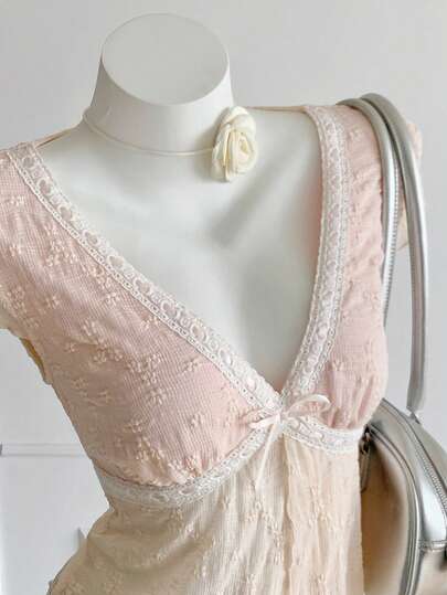 Comfortcana Áo thun nữ tay ngắn cổ chữ V màu hồng điểm nhấn nơ xinh xắn, kiểu dáng nữ tính, thích hợp cho mùa hè.