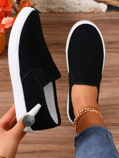 Tenis casuales de mujer de deporte para mujer, slip-on para primavera y otoño, de punta redonda, color negro y blanco solido , livianas modelo de tenis versátiles, zapatillas planas de lona para mujer corte bajo