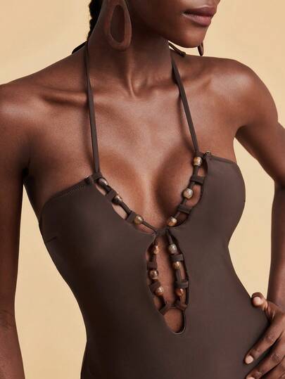 Travachic Traje de baño de una pieza de unicolor con cuentas para mujer, adecuado para vacaciones en la playa, fiestas en la piscina, fiestas en la playa