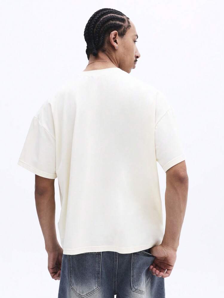 Camiseta Boxy Coastal Catch com estampa gráfica