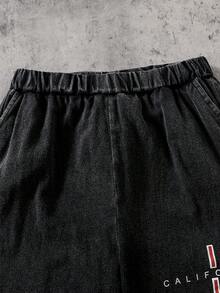 Coolqubz 两件套夏季新款休闲青少年男童套装，包括一件做旧水洗黑色短袖T恤和一条印有加州字母图案的松紧腰短裤，宽松版型，适合日常、通勤、运动、街头穿搭和ins风。 - 黑色 - 查看 5