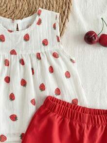 SHEIN Vintaside Kids 女童两件套夏季圆领无袖上衣搭配红色短裤。清新红白撞色，梭织面料，宽松版型。风格甜美、优雅、田园风，通体印有樱桃图案，活泼可爱。适合日常外出、上下学、参加派对、生日聚会、度假旅行等场合。 - 紅色 - 查看 6