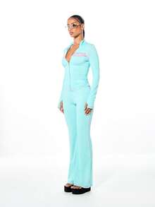 SUMWON WOMEN Women's High Rise Flare Pants With Back Graphic And Contrast Stitching Detail In Mint Turquoise - Green - View 6