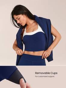 GLOWMODE FeatherFit™ Camiseta deportiva de ajuste ceñido con contrastes de color, tirantes cruzados, escote bajo, copas extraíbles, corta, para yoga, pilates, uso diario y casual en otoño e invierno - Dark Blue - Ver 3