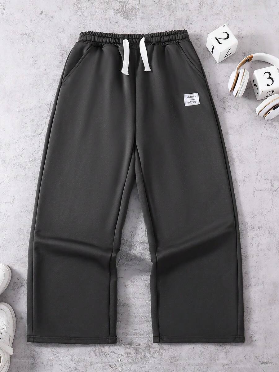 SHEIN Coolqubz 男士及青少年男孩时尚黑色柔软舒适休闲裤,适合户外、运动、上学及各种场合,白色抽绳腰带设计,是年轻男士的必备长裤。 - 深灰色 - 查看 1