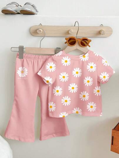 SHEIN Soft Matte Pink, Cute Sweet Bohemian Daisy Floral Print, Young Girl Casual Minimalist Short Sleeve Round Neck T-Shirt And Flare Pants Set, Suitable For Daily Wear, Street Style, Outing, Home, Vacation, Farm, Picnic, Homecoming, Back To School, Spring & Summer
