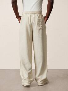 STYNVO Quần dài nam dáng suông, màu trơn, chất liệu vải sần, túi xéo, eo có dây rút. - Màu be - Xem 2
