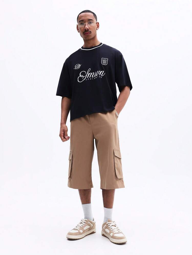 Oversized Graphic T-Shirt With Script Design