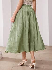 Modelyn Chân váy xanh lá cây mềm mại, rủ nhẹ, có họa tiết, dáng bất đối xứng, cạp chun co giãn, kiểu dáng suông, thanh lịch. - màu xanh lá - Xem 6