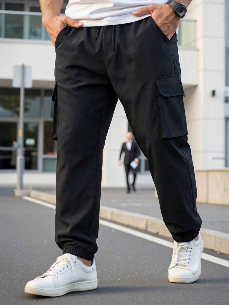 Manfinity Homme 男士加大码纯色工装裤,带抽绳下摆和口袋,外出纯色长款休闲裤黑色裤子,适合丈夫、男朋友的礼物黑色工装裤黑色工装裤男士黑色宽松裤男士裤子黑色,适合秋季 - 黑色 - 查看 1