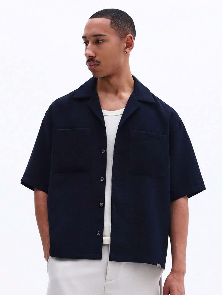 Marineblaues, kurzärmeliges Oversize-Hemd mit Knopfleiste