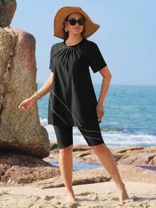 Swim Shayni 大码女式新款纯色两件式泳衣，做工精良，充满年轻中东风情，可拆卸胸垫，长袖，前侧褶皱裙摆，优雅几何线条及膝短裤，休闲时尚度假沙滩泳装 - 黑色 - 查看 5