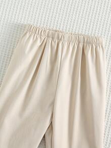 SHEIN Bộ đồ 3 món cho bé trai/bé gái màu trắng kiểu quý ông gồm áo sơ mi dài tay, áo phông, áo vest và quần, trang phục thanh lịch phù hợp cho mùa xuân/hè, ở nhà, đi chơi, tiệc sinh nhật, lễ rửa tội, sinh nhật lần thứ nhất, lễ kỷ niệm, khách dự đám cưới, phù rể, người giữ nhẫn. - Màu be - Xem 8