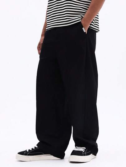 SUMWON Pantalones casuales de pierna ancha y ajuste relajado con bolsillos laterales, pantalones sueltos negros para uso diario