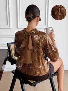 SHEIN Frenchy ملابس علوية أنيقة للنساء بلون أحادي مرقّع بالترتر والعقدة، ملابس علوية فرنسية رجعية بفيونكة من الترتر، أكمام فوانيس ذهبية بنية، ملابس نسائية فاخرة لامعة للحفلات، ملابس علوية مرصعة بالترتر، ملابس علوية لامعة، للصيف والعطلات والمناسبات الأنيقة، بلوزات للوصيفات، ملابس علوية للحفلات - بني - مشاهدة 5