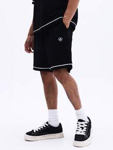 SUMWON Ensemble coordonné classique t-shirt col rond noir et short avec passepoil contrastant blanc. Tenue de détente décontractée pour l'été - Noir - Voir 4