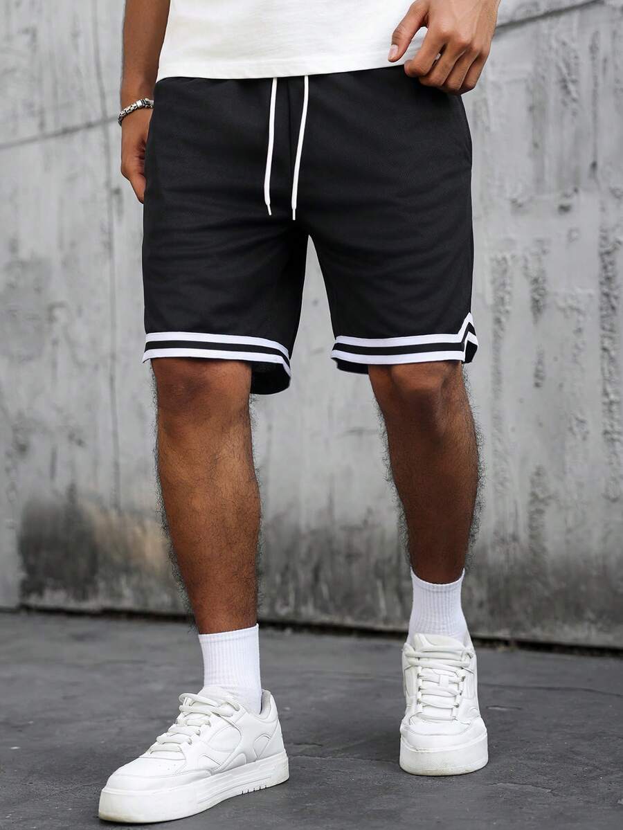 SLATEMANN Men's Street Academy Style, Sporty Casual Wear, Featuring An INS-Style Black Casual Shorts With A High Street Black-And-White Color-Blocking Design. These Loose-Fitting Shorts Have A Drawstring Design, Making Them Suitable For Music Festivals And Everyday Wear. - Black - View 1