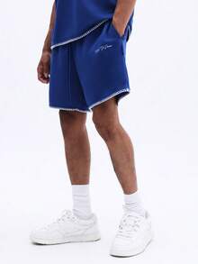 SUMWON Bộ đồ nam gồm áo thun cổ tròn và quần short, phối hợp với logo thêu chữ và đường chỉ tương phản, thích hợp cho trang phục thường ngày mùa hè. - Màu xanh lam - Xem 4