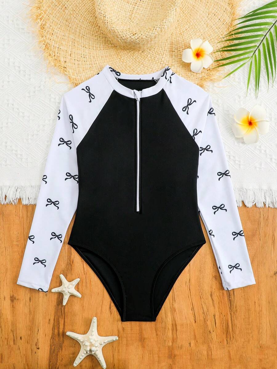 SHEIN 一件装,女童可爱蝴蝶结长袖连体泳衣,黑白针织面料,拉链设计,时尚优雅,适合游泳、海滩、泳池、夏季度假等场合。 - 黑與白 - 查看 1